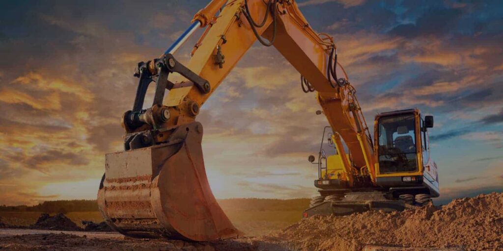 Excavator on an underground sewer line excavation