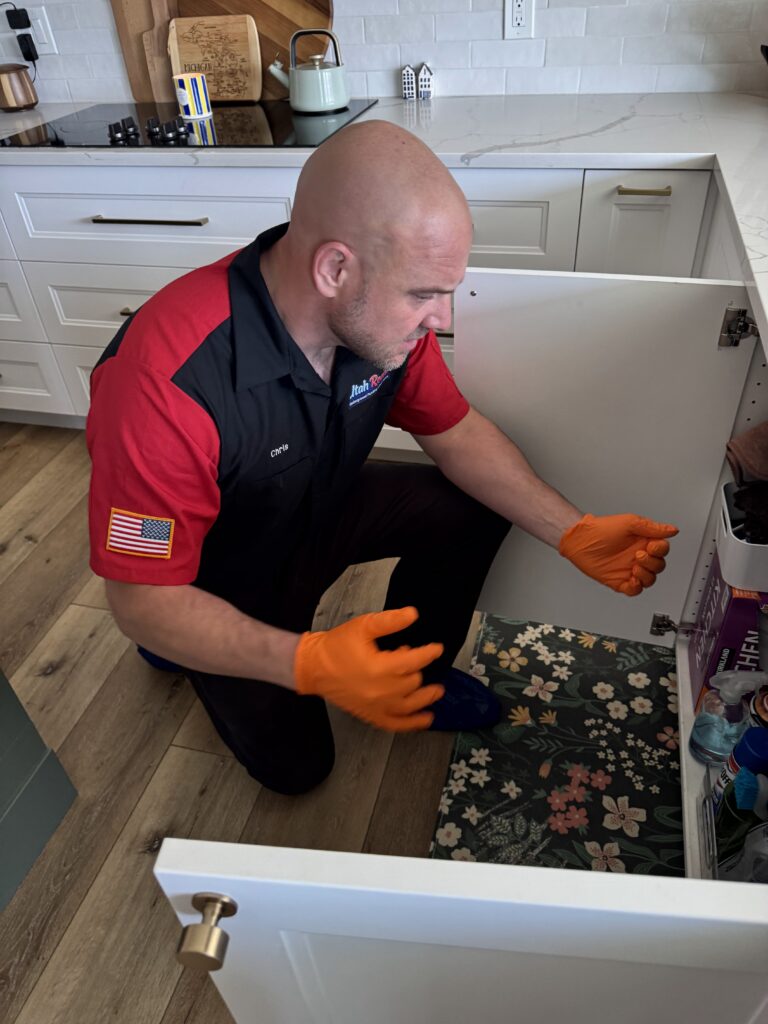 Utah Rooter technician on a Draper sewer and drain call