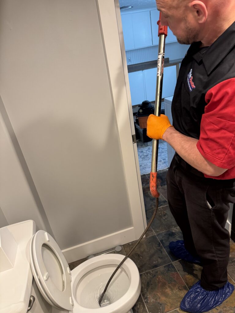 Utah Rooter technician clearing a main sewer line in West Jordan